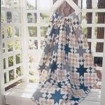 Checkered Star Scrap Lap Free Quilt Pattern from McCalls Quilting