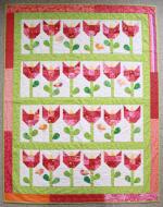 Tulip Free Quilt Pattern by Carolyn from Allspice Abounds