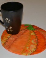 Pumpkin Crazy Quilt Mug Rug by Alexandra Henry for Pellon