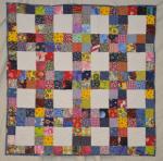 A Scrappy Baby Quilt Tutorial from Michelle's Romantic Tangle